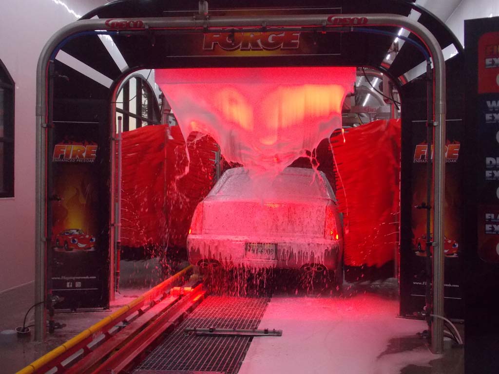 Car being washed inside a richmond va car wash